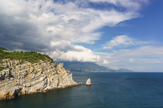 Fototapeta View of the picturesque Cape Limen-Burun and the rock Sail in the black sea resort of Crimea