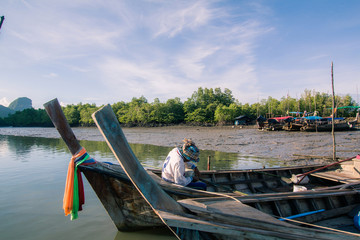 Thai Long tail boat Morning sky blue sky at Samed Nang Chee scenic spot Tropical area in Phang Nga...