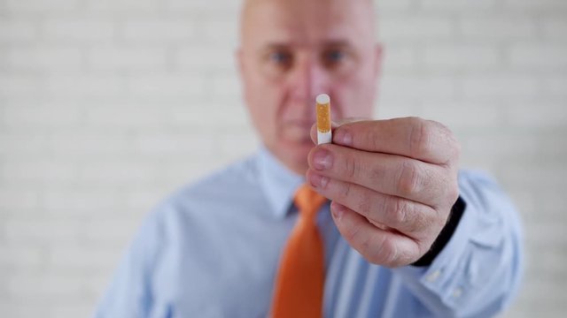 Businessperson Image Offering a Cigarette in a TV Anti Tobacco Campaign