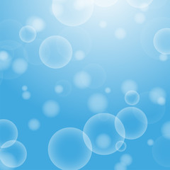 Light blue abstract background with a bokeh in the form of circles. Underwater world with air bubbles. Vector illustration.
