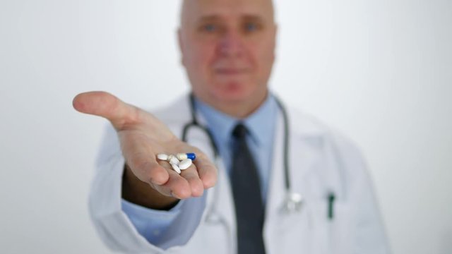 Confident Doctor Smiling and Presenting in Hand New Treatment with Colored Pills