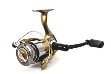 gold color fishing reel on a white background