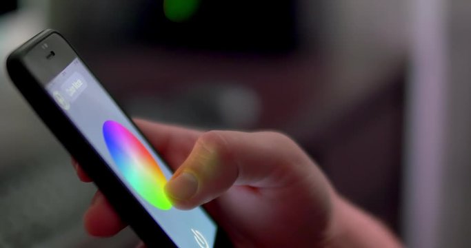 Changing color light in home. Smart Home automation. House managing with smartphone app