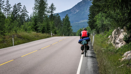 Cyclist on a mountain road in Norway.