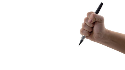 Female hand holding a marker pen like a knife. The power of the literature as a weapon. Handwriting instead of typing.
