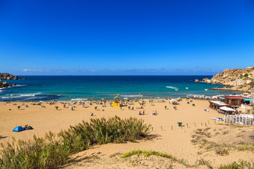 Fototapeta na wymiar Manikata, Malta. The famous beach Golden Bay in the same bay