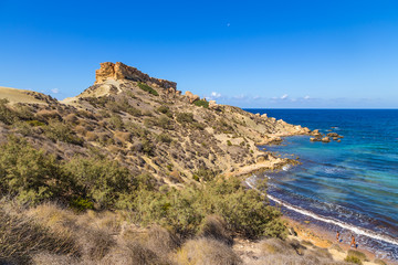 Fototapeta na wymiar Manicata, Malta. Ghajn Tuffieha Bay beach, also known as Riviera Beach