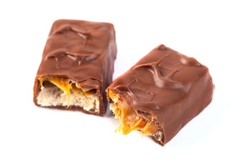Chocolate bar with caramel isolated on white
