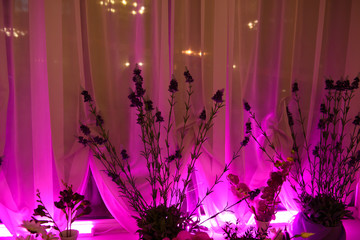 Holiday window light. The mood of happiness in the lighting of the room.