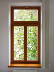 View of a wooden window from the inside