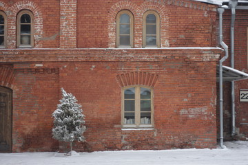 Red brick Moscow wall. Winter January