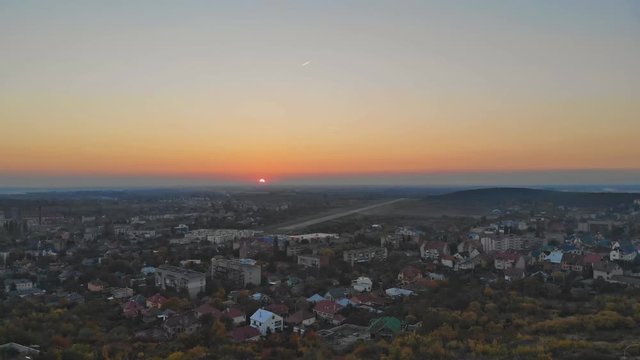Residential area of the city at sunset, aerial. Cityscape houses in small town in the countryside. Uzhhorod Ukraine Europe