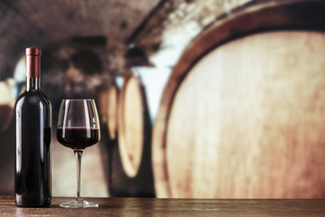 Wine tasting. Wine cellar with wine bottle and glasses.with space for text