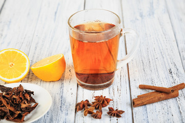 hot tea, cinnamon sticks, star anise and orange