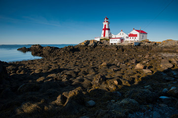Fototapeta na wymiar Canadian Lighthouse Protects During Low Tide