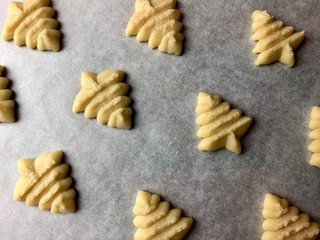 Spritz cookies on parchment paper 