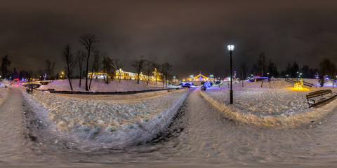 winter full spherical seamless panorama 360 degrees angle view in night park with new year illumination in equirectangular equidistant projection. VR AR content