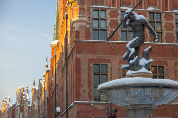 Pomorskie region, Poland - December, 2010: Neptun statue - fontain and Town Hall on Dlugi Targ street in Gdansk