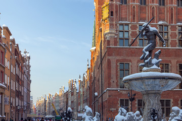 Pomorskie region, Poland - December, 2010: Neptun statue - fontain and Town Hall on Dlugi Targ...