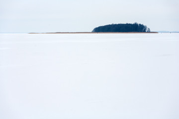 Island on the Sniardwy Lake in winter, the largest lake in Poland, Masuria Region, Poland