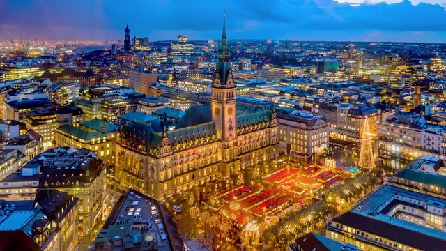 Historic Christmas market on Rathausmarkt in downtown Hamburg, Germany in the evening. 4K UHD time lapse video.