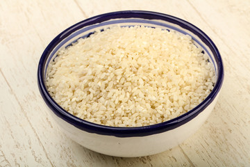 Fototapeta na wymiar Raw rice heap