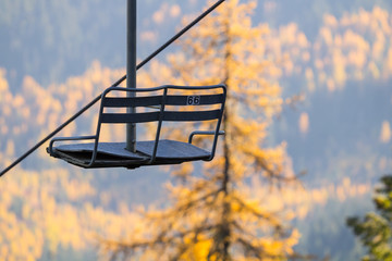 Empty Chair lift on an abandoned ski resort in the autumn