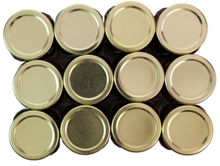 Isolated top view of a case of homemade organic jams, jellies and preserves.