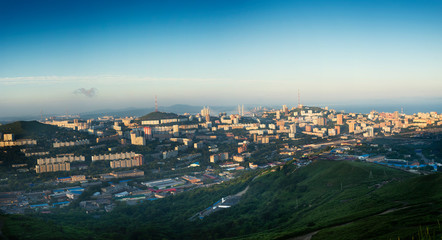 Fototapeta na wymiar The main city of Primorsky region Rossi city port of Vladivostok. View of the port city of Vladivostok, the top of the Hill.