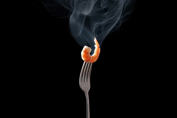 shrimp cooked on a black background