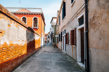 European old buildings and alley in Murano island, Venice, Italy