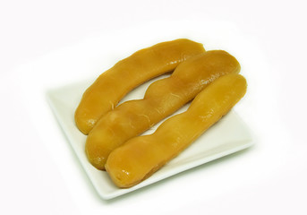 preserved sweet tamarind fruit isolated / tropical fruit peeled tamarind pickled fermented