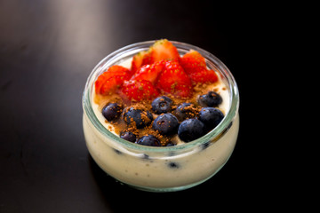 Smoothie bowl with banana, strawberry, blueberry