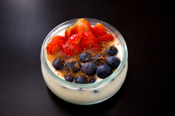 Smoothie bowl with banana, strawberry, blueberry