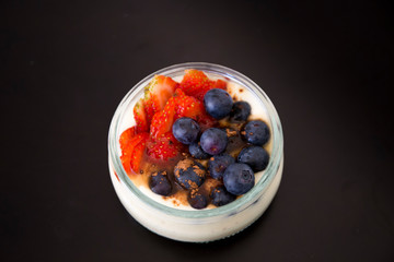 Smoothie bowl with banana, strawberry, blueberry