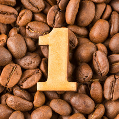 1, Number on wood- background of coffee beans.