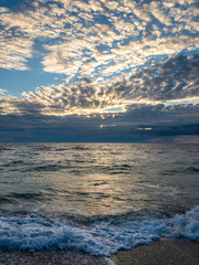 Obraz premium Ocean surf on the sandy beach