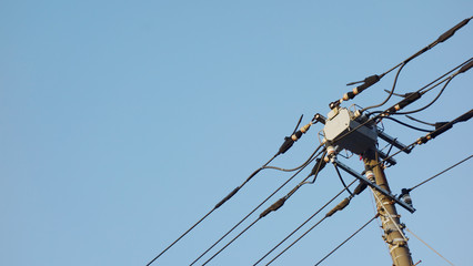 Tecnology of electric pole in Japan with blue sky background.