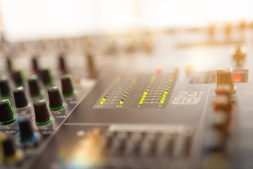 Professional audio mixing console with faders and adjusting knobs,TV equipment Black and White...