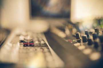 Professional audio mixing console with faders and adjusting knobs,TV equipment Black and White...