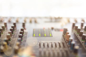 Professional audio mixing console with faders and adjusting knobs,TV equipment Black and White...