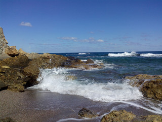 surt at the cliff in the sea cove