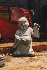 statues of  baby monks