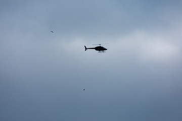 Helicopter cloudy sky