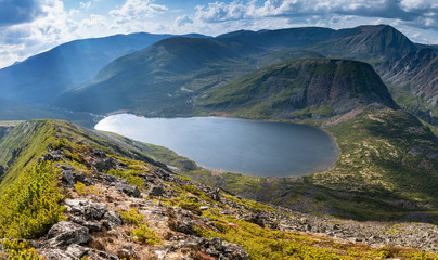 Naklejka na ściany i meble In the mountain ridge is Burey Russia's far East was Lake Big Suluk. Beautiful mountain lake Big Suluk in Khabarovsk region.