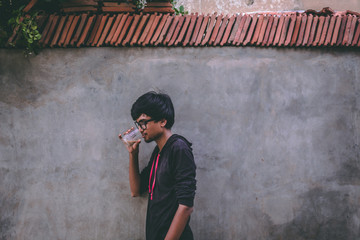 Young man drinking tea