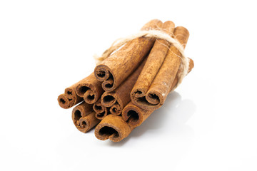 cinnamon sticks on white background