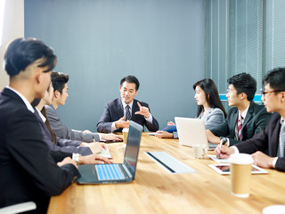 asian corporate business people meeting in office