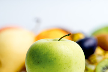 Creative layout made of fruits on a white background
