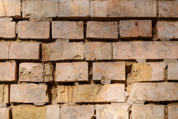 Details of textured aged brick wall. Can be used as background.